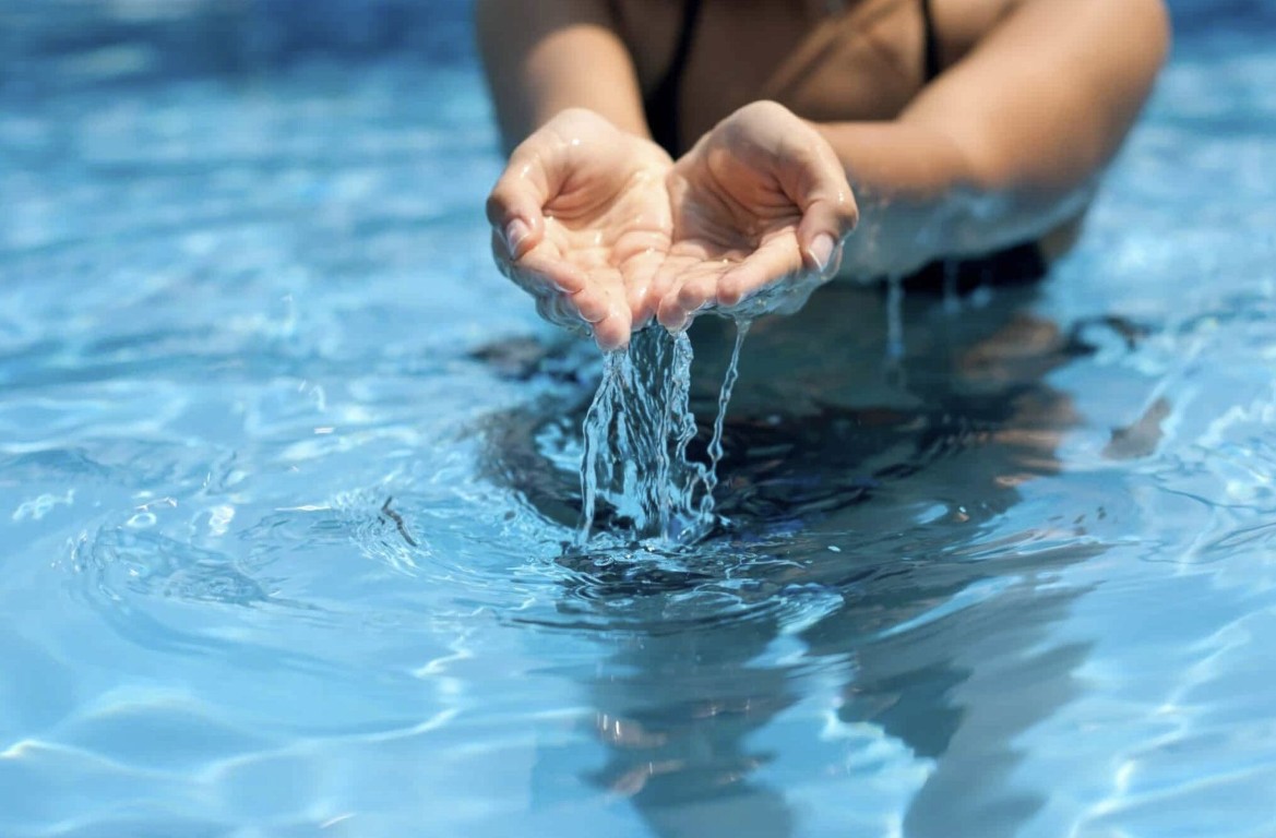 Crystal clear pool water maintained through regular professional service